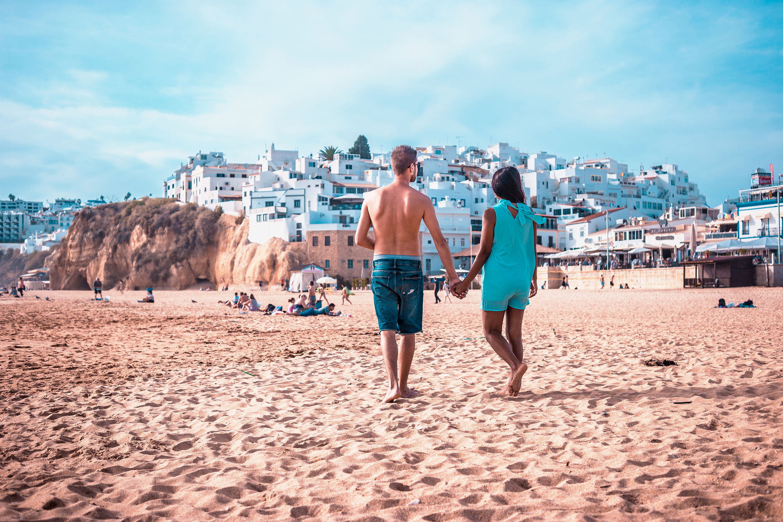 Happy,Young,Couple,Walking,At,The,Beach,Of,Albufeira,Algarve